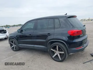 2014 Volkswagen Tiguan SE z VIN WVGAV3AXXEW535128, wystawiony jako IAAI lot #41882213 z przebiegiem 103 161 mil mil oraz . Historia ofert i sprzedaży dostępna na DreamBid. Obrazek 14.