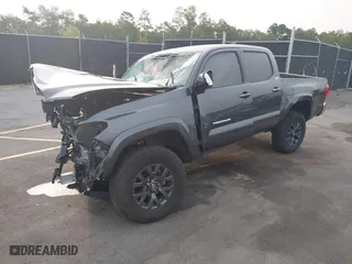 2023 Toyota Tacoma 2WD SR5 with VIN 3TMAZ5CNXPM203547, listed as a IAAI auction lot 40310875 with 32,411 mi miles. Bid and sale history available at carsss.com. Image 17.