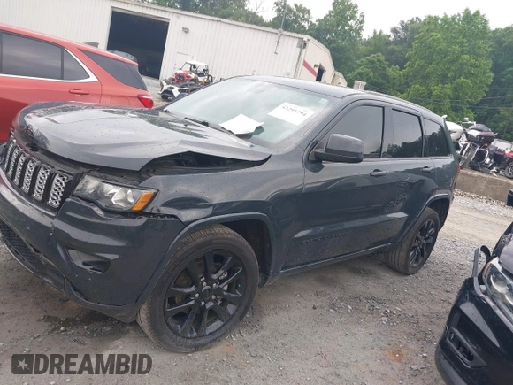 2018 Jeep Grand Cherokee Upland with VIN 1C4RJFAG4JC249243, listed as a IAAI auction lot 42291794 with 194,501 mi miles and . Bid and sale history available at DreamBid. Image 14.