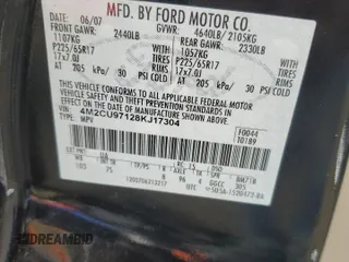2008 Mercury Mariner Premier z VIN 4M2CU97128KJ17304, wystawiony jako Copart lot #55965555 z przebiegiem 134 473 mil mil oraz Szkoda całkowita • Salvage title. Historia ofert i sprzedaży dostępna na DreamBid. Obrazek 13.