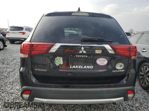 2018 Mitsubishi Outlander ES with VIN JA4AD2A34JZ006680, listed as a Copart auction lot 59897555 with 56,709 mi miles and Salvage title. Bid and sale history available at DreamBid. Image 6.