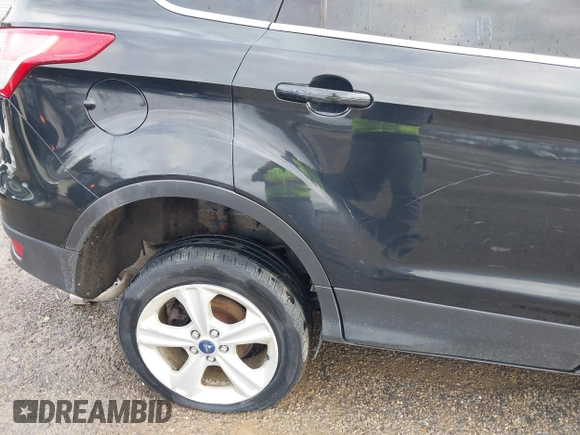 2013 Ford Escape SE with VIN 1FMCU9GX9DUD34661, listed as a IAAI auction lot 41945565 with 239,752 mi miles and . Bid and sale history available at DreamBid. Image 21.