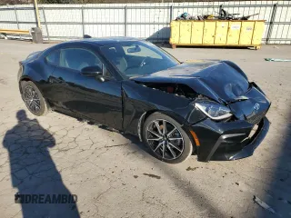 2023 Toyota GR86 with VIN JF1ZNBB12P9763031, listed as a Copart auction lot 81593314 with 7,411 mi miles and Salvage Title. Bid and sale history available at carsss.com. Image 4.