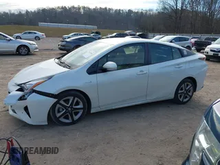 2016 Toyota Prius Four with VIN JTDKARFU3G3021048, listed as a IAAI auction lot 41633306 with 120,632 mi miles. Bid and sale history available at carsss.com. Image 14.