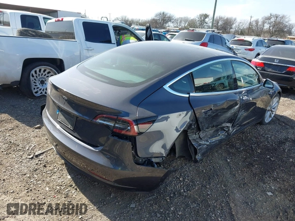 2020 Tesla Model 3 Long Range with VIN 5YJ3E1EB6LF666624, listed as a IAAI auction lot 41720664 with 65,973 mi miles. Bid and sale history available at carsss.com. Image 4.