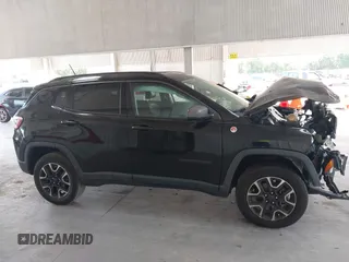 2020 Jeep Compass Trailhawk with VIN 3C4NJDDB3LT170463, listed as a IAAI auction lot 42446080 with 83,336 mi miles and . Bid and sale history available at DreamBid. Image 14.