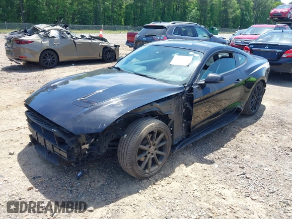 2019 Ford Mustang EcoBoost with VIN 1FA6P8TH4K5159573, listed as a IAAI auction lot 42207962 with 121,225 mi miles and . Bid and sale history available at DreamBid. Image 18.