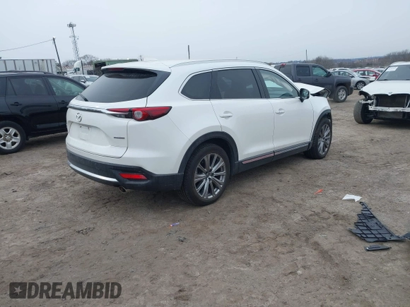 2021 Mazda CX-9 Signature with VIN JM3TCBEY0M0510960, listed as a IAAI auction lot 41334221 with 44,388 mi miles. Bid and sale history available at carsss.com. Image 4.