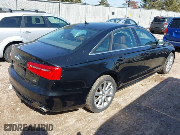 2014 Audi A6 Prestige z VIN WAUHMAFCXEN014381, wystawiony jako IAAI lot #41794551 z przebiegiem 133 649 mil mil oraz . Historia ofert i sprzedaży dostępna na DreamBid. Obrazek 4.