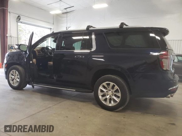 2021 Chevrolet Suburban Premier z VIN 1GNSCFKD2MR318276, wystawiony jako Copart lot #37848743 z przebiegiem 33 165 mil mil oraz Szkoda całkowita • Salvage title. Historia ofert i sprzedaży dostępna na DreamBid. Obrazek 2.