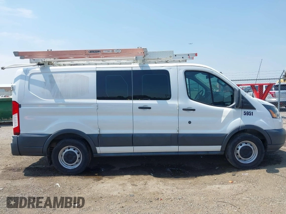 2016 Ford Transit Cargo with VIN 1FTYE1ZM1GKB27189, listed as a IAAI auction lot 40110239 with 131,106 mi miles and . Bid and sale history available at carsss.com. Image 13.