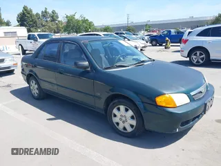 2000 Mazda Protege DX z VIN JM1BJ2221Y0268907, wystawiony jako IAAI lot #42277748 z przebiegiem 221 839 mil mil oraz . Historia ofert i sprzedaży dostępna na DreamBid. Obrazek 1.