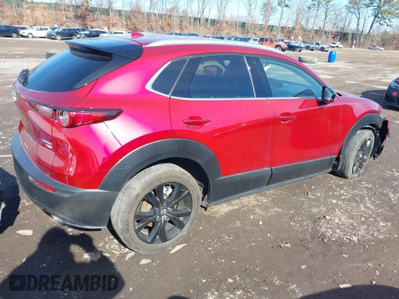 2022 Mazda CX-30 2.5 Turbo Premium Package with VIN 3MVDMBDY1NM458943, listed as a IAAI auction lot 41513141 with 16,858 mi miles. Bid and sale history available at carsss.com. Image 4.
