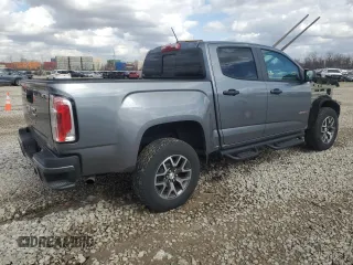 2021 GMC Canyon 4WD AT4 w/Leather with VIN 1GTG6FEN7M1149820, listed as a Copart auction lot 47602535 with 43,412 mi miles and Salvage Title. Bid and sale history available at carsss.com. Image 3.