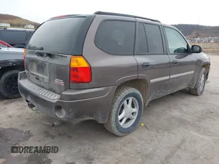 2008 GMC Envoy SLE2 with VIN 1GKDT13S482236375, listed as a IAAI auction lot 41510610 with 183,716 mi miles. Bid and sale history available at carsss.com. Image 4.