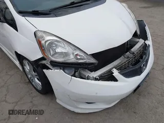 2009 Honda Fit Sport with VIN JHMGE88409S021730, listed as a IAAI auction lot 42045023 with 309,995 mi miles. Bid and sale history available at carsss.com. Image 6.