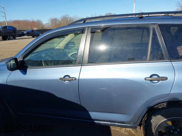 2006 Toyota RAV4 with VIN JTMBD33V766021794, listed as a IAAI auction lot 41817927 with 164,112 mi miles. Bid and sale history available at carsss.com. Image 14.