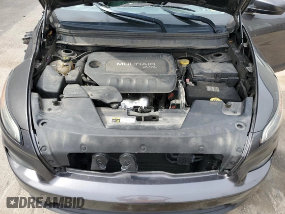 2014 Jeep Cherokee Altitude with VIN 1C4PJMCB6EW273268, listed as a Copart auction lot 53517545 with 225,774 mi miles and Salvage Title. Bid and sale history available at DreamBid. Image 12.