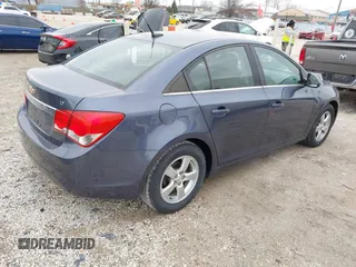 2014 Chevrolet Cruze 1LT with VIN 1G1PC5SB3E7467938, listed as a IAAI auction lot 41900700 with 125,040 mi miles and . Bid and sale history available at DreamBid. Image 4.