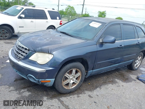 2007 Chrysler Pacifica Touring z VIN 2A8GM68XX7R337064, wystawiony jako IAAI lot #42089124 z przebiegiem 226 919 mil mil oraz . Historia ofert i sprzedaży dostępna na DreamBid. Obrazek 2.