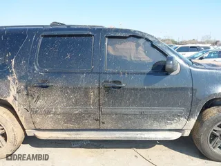 2012 Chevrolet Suburban LT with VIN 1GNSCJE09CR237611, listed as a IAAI auction lot 41697643 with 184,920 mi miles. Bid and sale history available at carsss.com. Image 12.