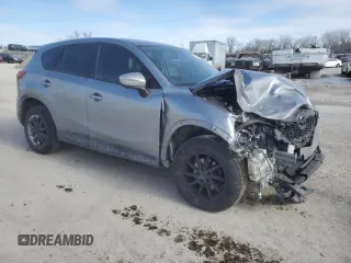 2015 Mazda CX-5 Touring with VIN JM3KE4CY4F0467571, listed as a Copart auction lot 88919035 with 197,755 mi miles and Salvage Title. Bid and sale history available at carsss.com. Image 4.