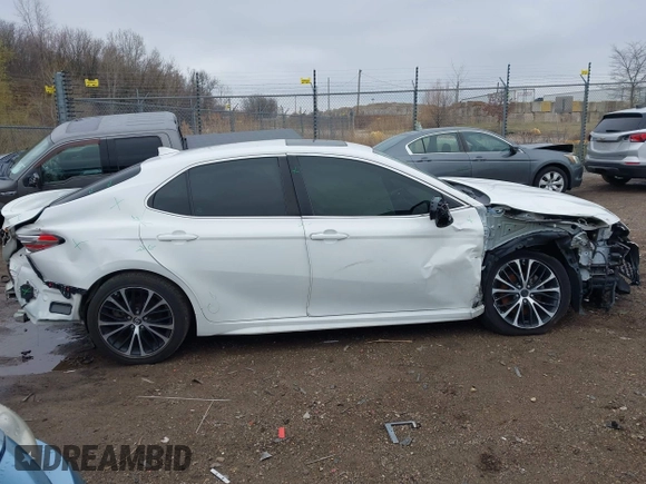 2019 Toyota Camry LE z VIN 4T1B11HK7KU687261, wystawiony jako IAAI lot #42016114 z przebiegiem 123 007 mil mil oraz . Historia ofert i sprzedaży dostępna na DreamBid. Obrazek 13.