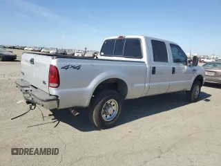 2002 Ford F-250 XL with VIN 1FTNW21L92ED10310, listed as a Copart auction lot 59132935 with 217,885 mi miles and Salvage title. Bid and sale history available at DreamBid. Image 3.
