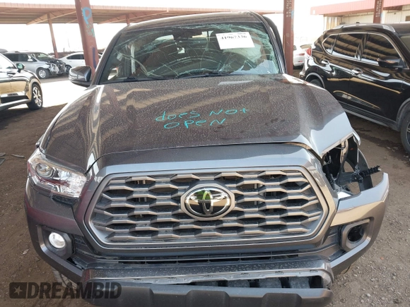 2022 Toyota Tacoma SR z VIN 3TYCZ5AN1NT062445, wystawiony jako IAAI lot #41967336 z przebiegiem Nie podano mil oraz . Historia ofert i sprzedaży dostępna na DreamBid. Obrazek 10.