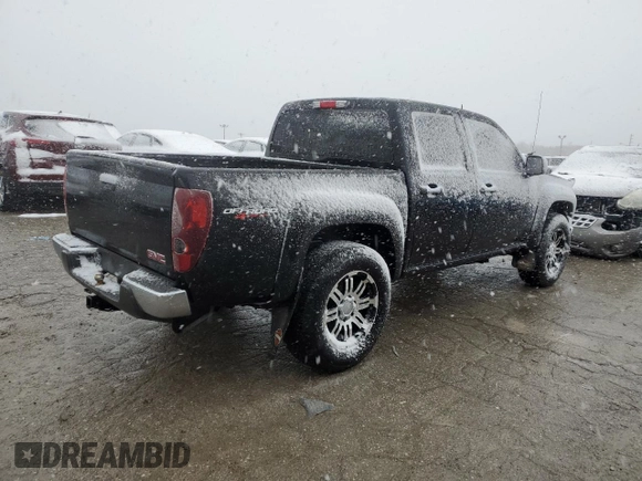 2011 GMC Canyon SLE1 z VIN 1GTH6MFE6B8141218, wystawiony jako Copart lot #81897704 z przebiegiem 233 039 mil mil oraz Szkoda całkowita • Salvage title. Historia ofert i sprzedaży dostępna na DreamBid. Obrazek 3.