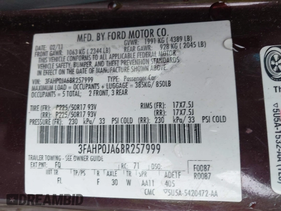 2011 Ford Fusion SEL with VIN 3FAHP0JA6BR257999, listed as a IAAI auction lot 42199423 with 126,855 mi miles. Bid and sale history available at carsss.com. Image 9.