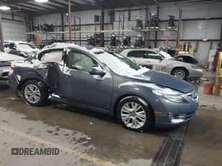 2009 Mazda 6 i Touring with VIN 1YVHP82A495M38694, listed as a IAAI auction lot 41577128 with 230,557 mi miles. Bid and sale history available at carsss.com. Image 1.