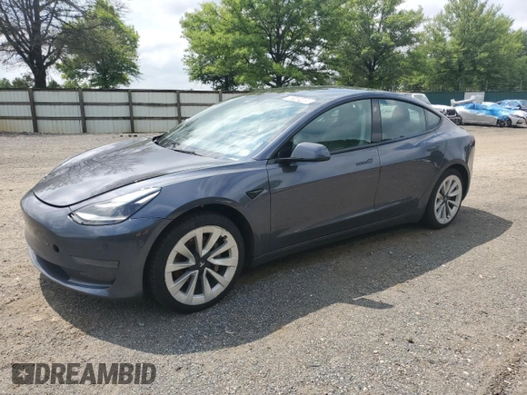 2022 Tesla Model 3 z VIN 5YJ3E1EA6NF185895, wystawiony jako Copart lot #60165405 z przebiegiem 190 572 mil mil oraz Czysty tytuł • Clean title. Historia ofert i sprzedaży dostępna na DreamBid. Obrazek 1.