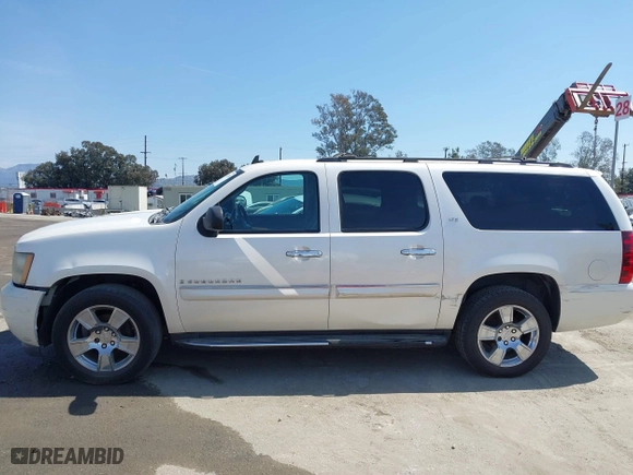 2008 Chevrolet Suburban LTZ with VIN 1GNFC16058R198040, listed as a IAAI auction lot 41421238 with 215,591 mi miles. Bid and sale history available at carsss.com. Image 14.