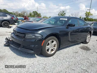 2015 Dodge Charger SE z VIN 2C3CDXBG8FH776308, wystawiony jako Copart lot #56364435 z przebiegiem 145 005 mil mil oraz Szkoda całkowita • Salvage title. Historia ofert i sprzedaży dostępna na DreamBid. Obrazek 1.