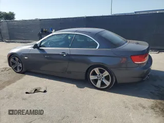 2007 BMW 3 Series 335i with VIN WBAWL73597PX50397, listed as a Copart auction lot 57221765 with 124,787 mi miles and Salvage title. Bid and sale history available at DreamBid. Image 2.