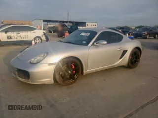 2006 Porsche Cayman S с VIN WP0AB29866U785239, выставлен на аукционе Copart как лот 51318955 с пробегом 102 301 миль миль и Списание • Salvage title. История ставок и продаж доступна на DreamBid. Изображение 1.