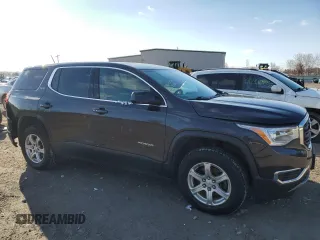 2017 GMC Acadia SLE with VIN 1GKKNRLA7HZ241424, listed as a Copart auction lot 50952505 with 142,860 mi miles and Salvage title. Bid and sale history available at DreamBid. Image 4.