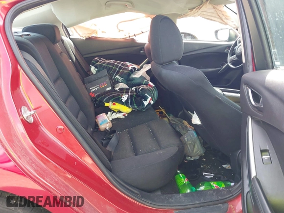 2016 Mazda 6 i Sport with VIN JM1GJ1U53G1409105, listed as a IAAI auction lot 41828135 with 136,812 mi miles and . Bid and sale history available at DreamBid. Image 8.