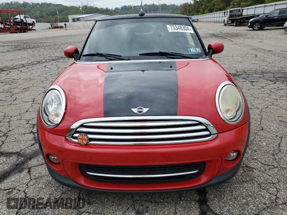2011 MINI Convertible with VIN WMWZN3C51BTZ78331, listed as a Copart auction lot 73348304 with 94,219 mi miles and Salvage title. Bid and sale history available at DreamBid. Image 5.