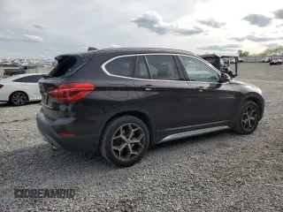2019 BMW X1 xDrive28i with VIN WBXHT3C53K5N27090, listed as a Copart auction lot 54150485 with 79,835 mi miles and Salvage title. Bid and sale history available at DreamBid. Image 3.