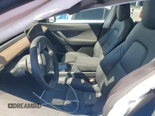 2020 Tesla Model Y Long Range with VIN 5YJYGDEE8LF045798, listed as a Copart auction lot 53689115 with 35,882 mi miles and Salvage Title. Bid and sale history available at DreamBid. Image 7.