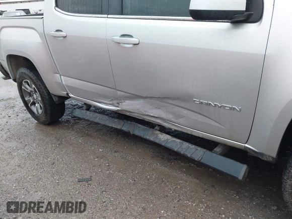 2017 GMC Canyon 2WD SLE with VIN 1GTG5CEA7H1211415, listed as a IAAI auction lot 41954800 with 145,609 mi miles. Bid and sale history available at carsss.com. Image 12.