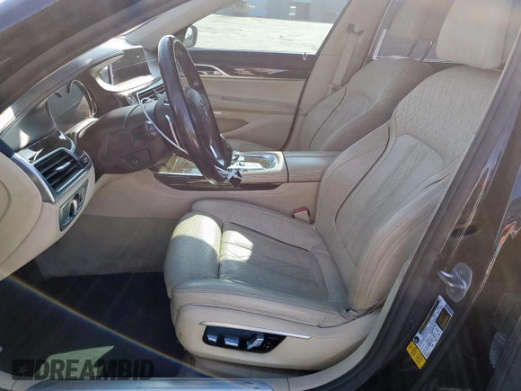2016 BMW 7 Series 740i с VIN WBA7E2C55GG504304, выставлен на аукционе Copart как лот 59251345 с пробегом 115 942 миль миль и Чистый • Clean title. История ставок и продаж доступна на DreamBid. Изображение 7.