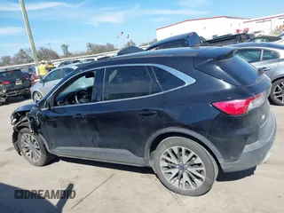 2020 Ford Escape Titanium Hybrid with VIN 1FMCU0DZ9LUC08090, listed as a IAAI auction lot 41674697 with 43,586 mi miles and . Bid and sale history available at DreamBid. Image 14.