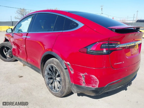 2016 Tesla Model X 70D with VIN 5YJXCAE27GF021994, listed as a IAAI auction lot 41976475 with 70,771 mi miles. Bid and sale history available at carsss.com. Image 3.