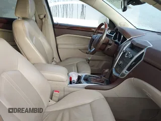 2011 Cadillac SRX Performance Collection with VIN 3GYFNBEY4BS600709, listed as a IAAI auction lot 40858453 with 148,769 mi miles. Bid and sale history available at carsss.com. Image 5.