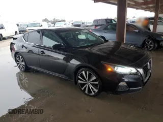 2019 Nissan Altima SR with VIN 1N4AL4CV6KC257701, listed as a Copart auction lot 79072124 with 82,697 mi miles and Salvage Title. Bid and sale history available at carsss.com. Image 4.