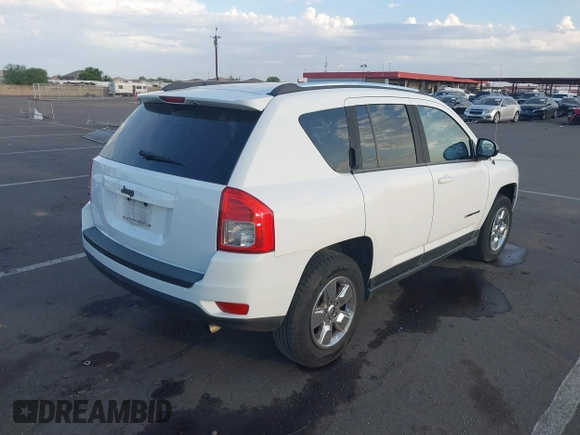 2013 Jeep Compass Sport with VIN 1C4NJCBA1DD272937, listed as a IAAI auction lot 39855648 with 118,136 mi miles. Bid and sale history available at carsss.com. Image 4.