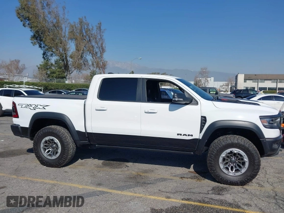 2022 Ram 1500 TRX with VIN 1C6SRFU93NN172647, listed as a IAAI auction lot 41539123 with 18,016 mi miles and . Bid and sale history available at DreamBid. Image 13.